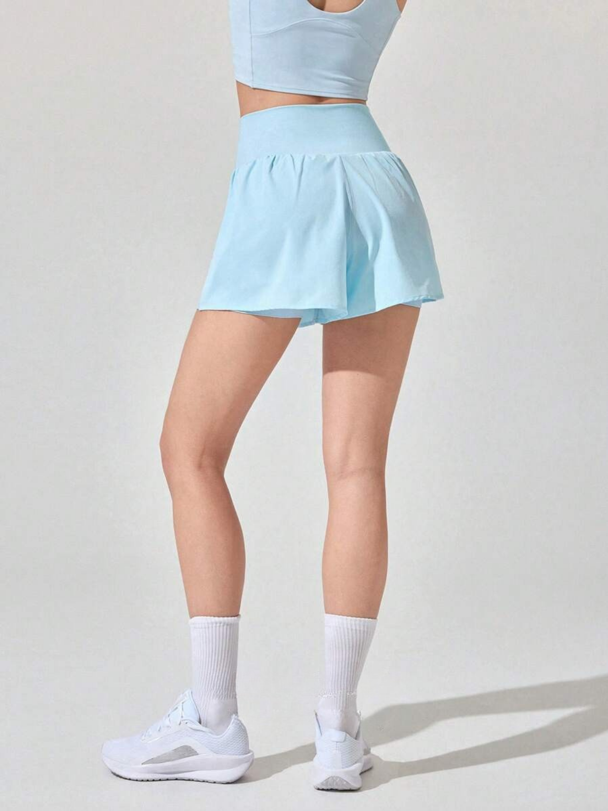 Schweißabweisende Laufshorts mit mittelhohem Bund, Taschen und schnelltrocknend