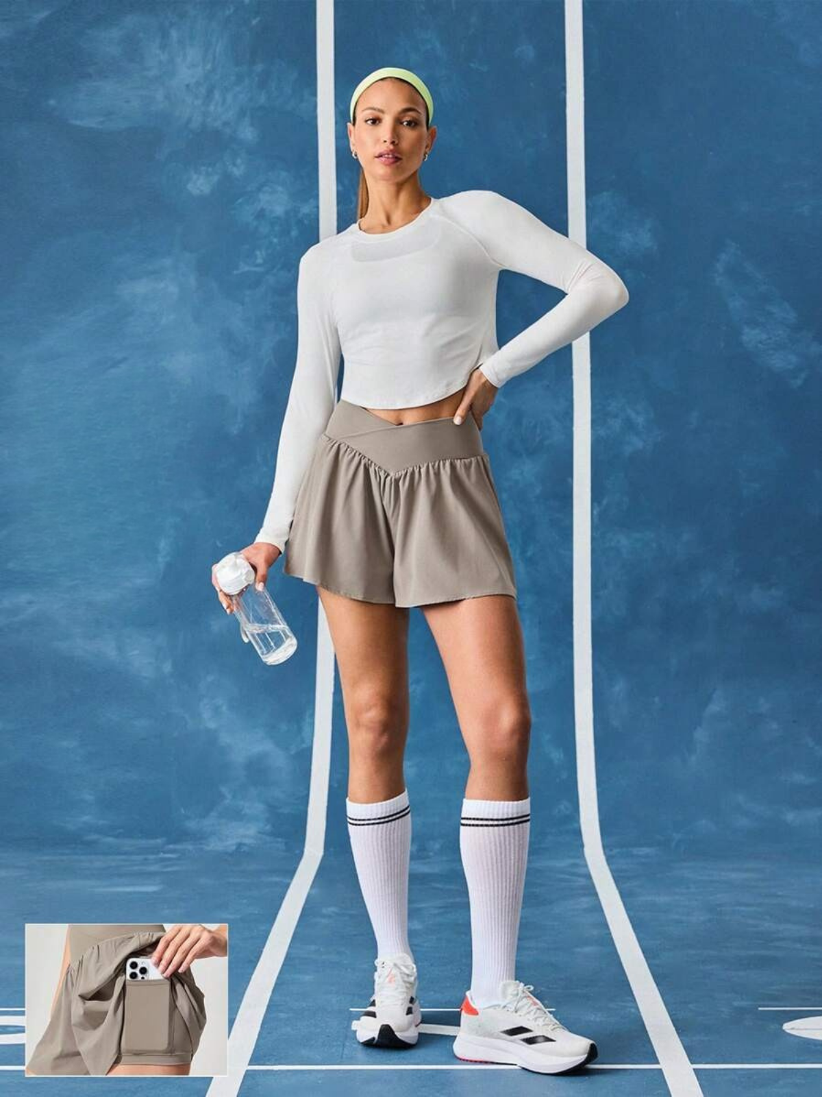 Schweißabweisende Laufshorts mit mittelhohem Bund, Taschen und schnelltrocknend