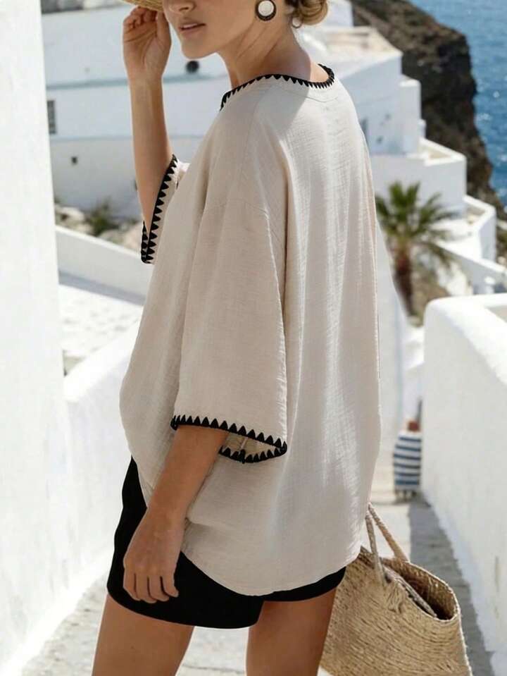 Flowy V-Neck Summer Top with Elegant Black Trim